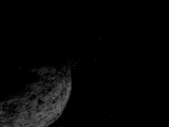 Asteroid Bennu is seen here ejecting particles from its surface on Jan. 19, 2019